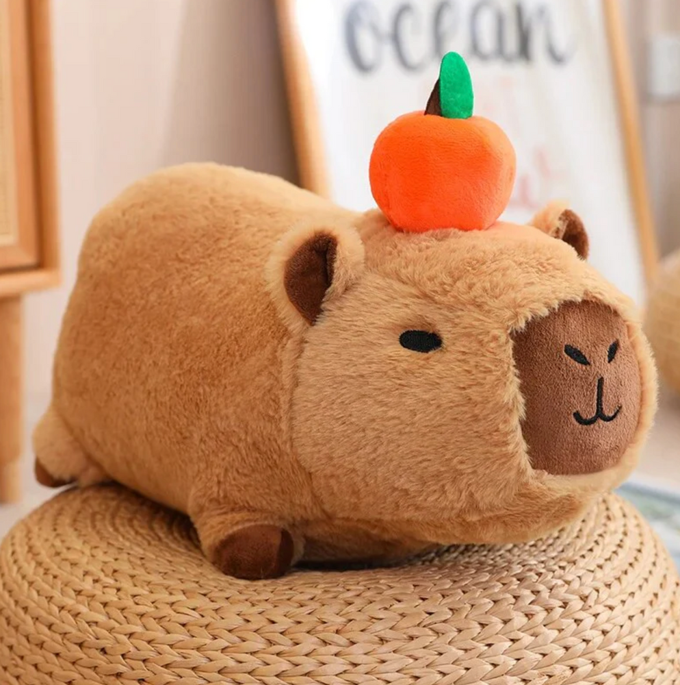 
                
                    Load image into Gallery viewer, Capybara Plushy with Orange
                
            